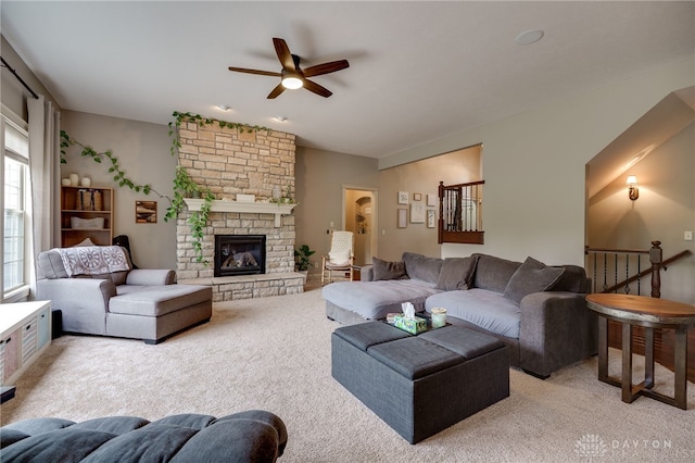10067 Yearling Run, Dayton, OH 45458 - living room with ceiling fan, light carpet, and a fireplace