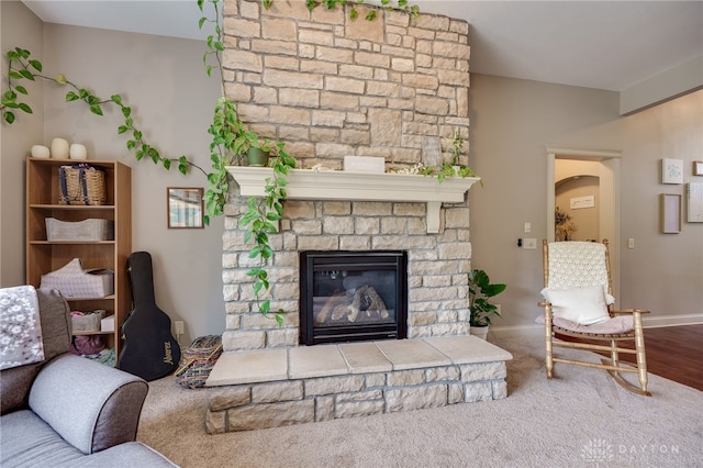 10067 Yearling Run, Dayton, OH 45458 - living room featuring a large fireplace and baseboards