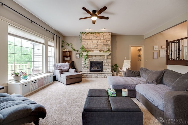 10067 Yearling Run, Dayton, OH 45458 - living room with a ceiling fan, light colored carpet, and a fireplace