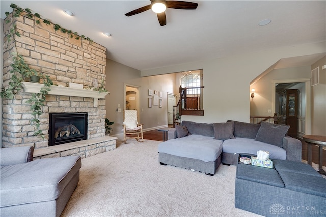 10067 Yearling Run, Dayton, OH 45458 - carpeted living area featuring a ceiling fan and a fireplace