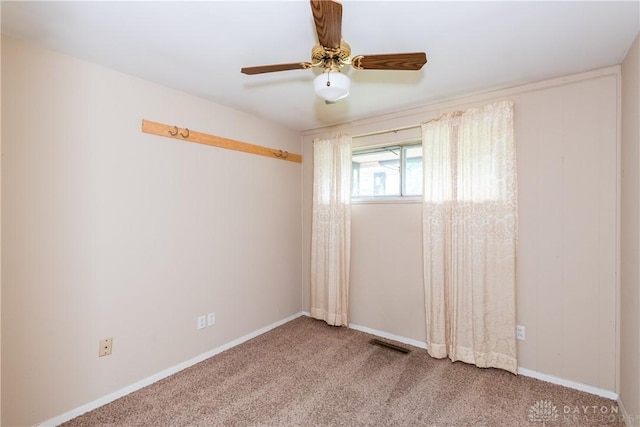 5501 Harshmanville Rd, Dayton, OH 45424 - unfurnished room featuring carpet, ceiling fan, and baseboards