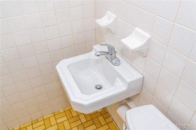 5501 Harshmanville Rd, Dayton, OH 45424 - bathroom with tile walls and a sink