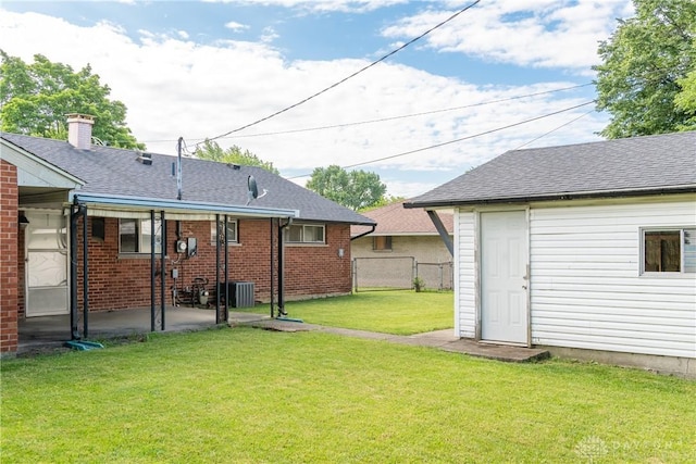 5501 Harshmanville Rd, Dayton, OH 45424 - view of yard with a patio and central AC