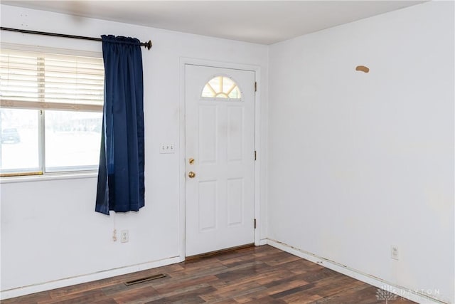 5501 Harshmanville Rd, Dayton, OH 45424 - foyer with plenty of natural light and dark wood-style flooring