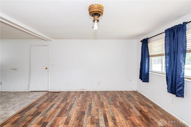 5501 Harshmanville Rd, Dayton, OH 45424 - empty room with wood finished floors and baseboards