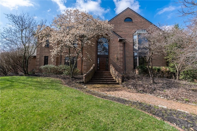 514 Shambord Cir, Kettering, OH 45429 - view of front of property with brick siding and a front lawn