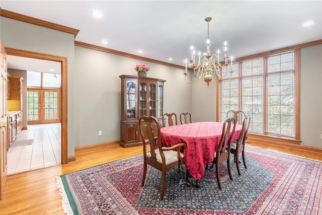514 Shambord Cir, Kettering, OH 45429 - dining space featuring a chandelier, crown molding, light wood finished floors, baseboards, and recessed lighting