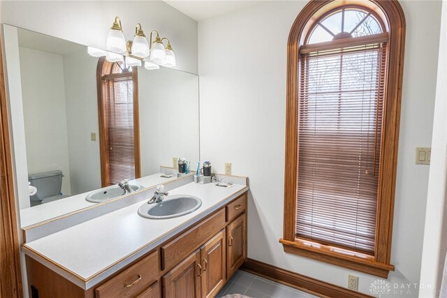 514 Shambord Cir, Kettering, OH 45429 - bathroom with vanity, toilet, and tile patterned floors
