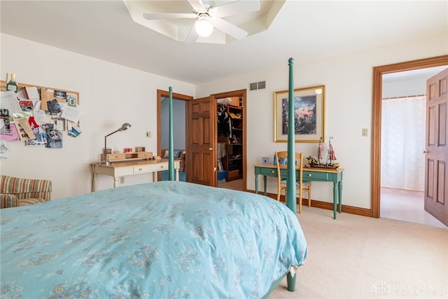 514 Shambord Cir, Kettering, OH 45429 - bedroom with light colored carpet, a spacious closet, ceiling fan, and baseboards