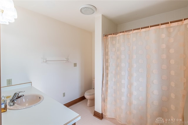514 Shambord Cir, Kettering, OH 45429 - bathroom with toilet, vanity, tile patterned flooring, and a shower with curtain