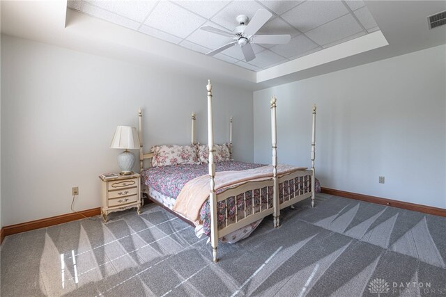 514 Shambord Cir, Kettering, OH 45429 - bedroom with baseboards, carpet floors, a raised ceiling, ceiling fan, and a paneled ceiling