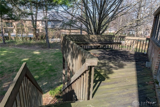 514 Shambord Cir, Kettering, OH 45429 - wooden deck featuring a lawn