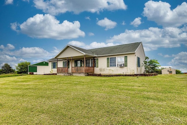6423 Howe Rd, Middletown, OH 45042 - view of front facade with covered porch, a front yard, and cooling unit