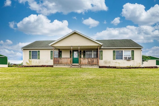 6423 Howe Rd, Middletown, OH 45042 - ranch-style home with a porch, cooling unit, a front lawn, and a shingled roof