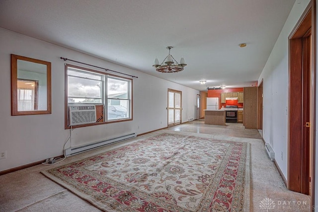 6423 Howe Rd, Middletown, OH 45042 - unfurnished living room with baseboard heating, a chandelier, light colored carpet, and baseboards