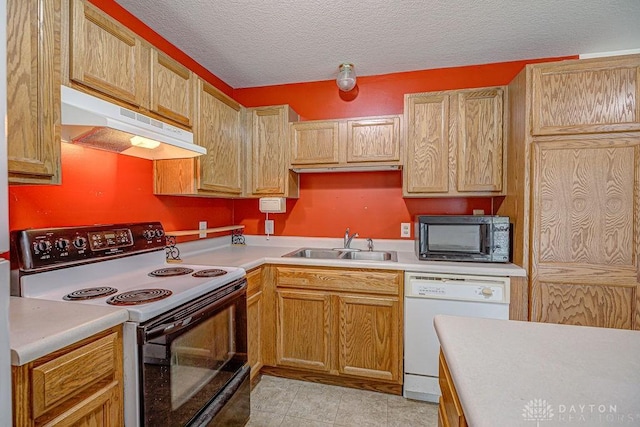 6423 Howe Rd, Middletown, OH 45042 - kitchen with electric stove, under cabinet range hood, black microwave, dishwasher, and a sink