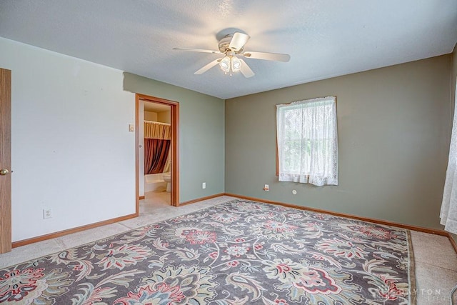 6423 Howe Rd, Middletown, OH 45042 - spare room featuring light colored carpet, ceiling fan, baseboards, and a textured ceiling