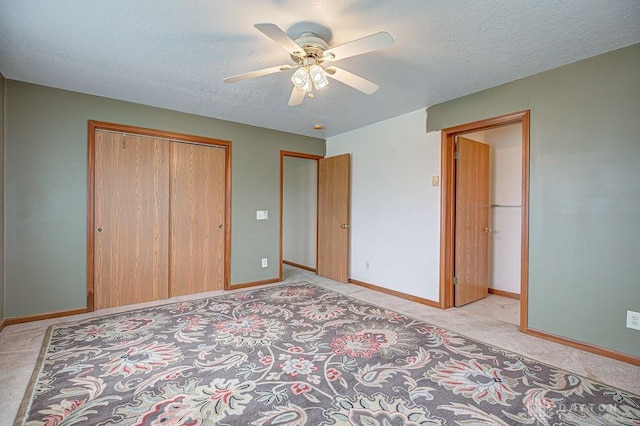 6423 Howe Rd, Middletown, OH 45042 - unfurnished bedroom featuring light colored carpet, a textured ceiling, baseboards, a closet, and a ceiling fan