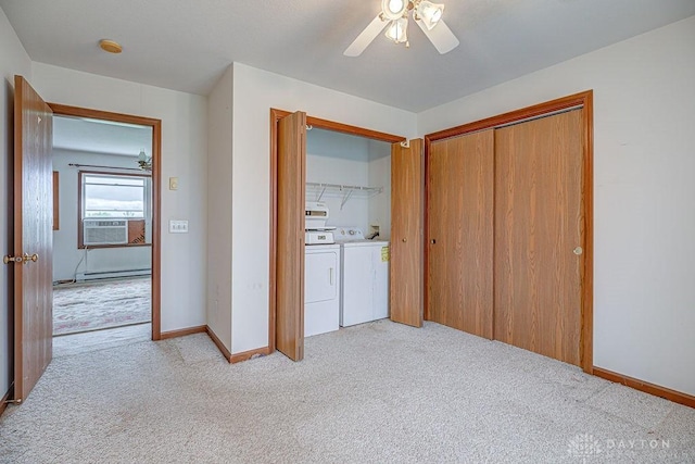 6423 Howe Rd, Middletown, OH 45042 - unfurnished bedroom with independent washer and dryer, light carpet, a closet, baseboard heating, and baseboards