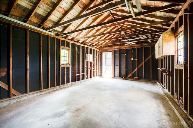 1533 Weaver St, Dayton, OH 45417 - miscellaneous room with lofted ceiling, concrete flooring, and a garage