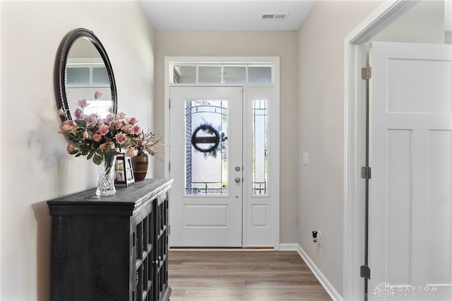 4978 Renaissance Park Dr, Middletown, OH 45005 - foyer featuring light wood-style flooring and baseboards