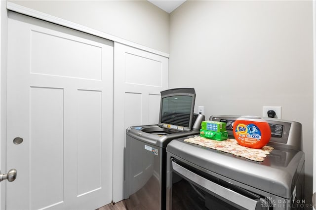 4978 Renaissance Park Dr, Middletown, OH 45005 - washroom with separate washer and dryer and light wood-style flooring