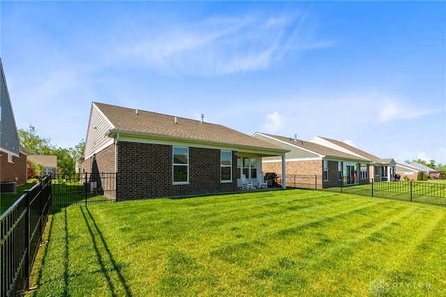 4978 Renaissance Park Dr, Middletown, OH 45005 - rear view of house featuring brick siding