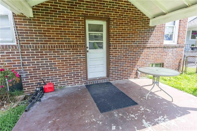 2312 Saint Charles Ave, Dayton, OH 45410 - property entrance featuring a patio and brick siding