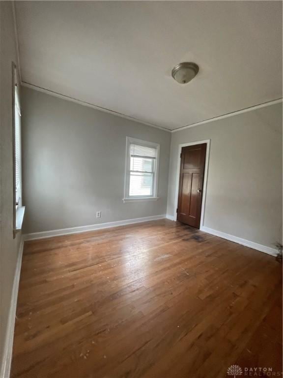 508 W Hillcrest Ave, Dayton, OH 45406 - empty room featuring wood finished floors and baseboards