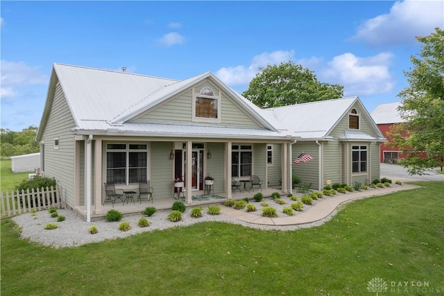 1134 N Webb Rd, Adams Twp, OH 45177 - view of front of home featuring a porch and metal roof