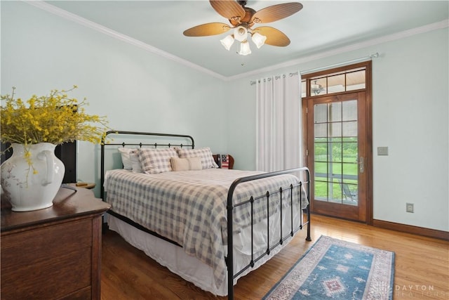 1134 N Webb Rd, Adams Twp, OH 45177 - bedroom featuring wood finished floors, baseboards, ornamental molding, access to outside, and ceiling fan