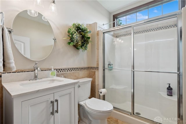 1134 N Webb Rd, Adams Twp, OH 45177 - full bath featuring tile walls, a stall shower, toilet, and vanity