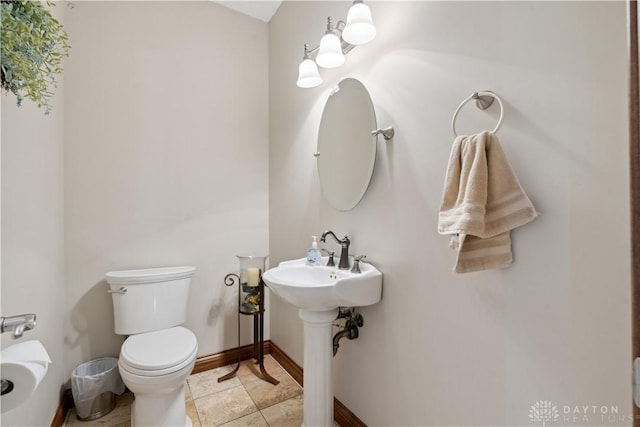1134 N Webb Rd, Adams Twp, OH 45177 - half bath featuring toilet, tile patterned floors, and baseboards