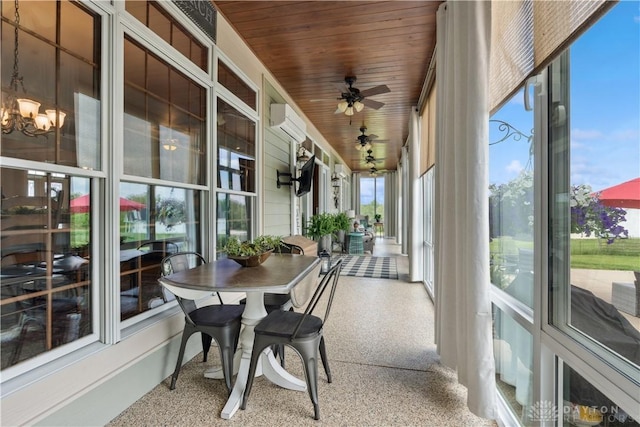 1134 N Webb Rd, Adams Twp, OH 45177 - sunroom / solarium featuring a wall unit AC, speckle patterned floor, wood ceiling, and a chandelier