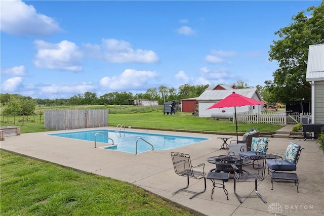 1134 N Webb Rd, Adams Twp, OH 45177 - outdoor pool featuring a fire pit and a patio
