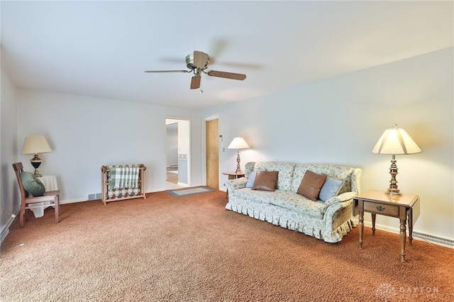 300 Magnolia Ave, Englewood, OH 45322 - carpeted living room featuring a ceiling fan and baseboards