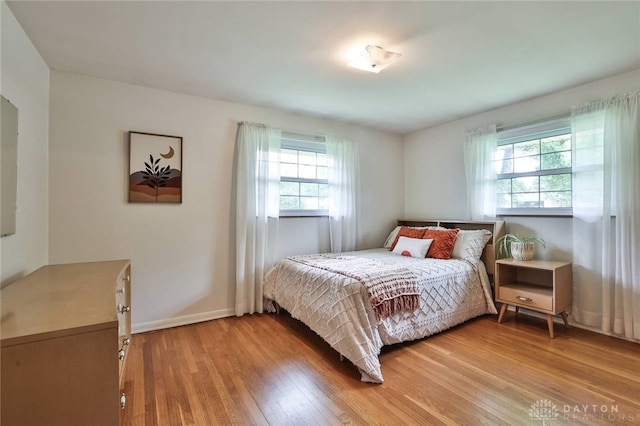 300 Magnolia Ave, Englewood, OH 45322 - bedroom with light wood-type flooring and baseboards