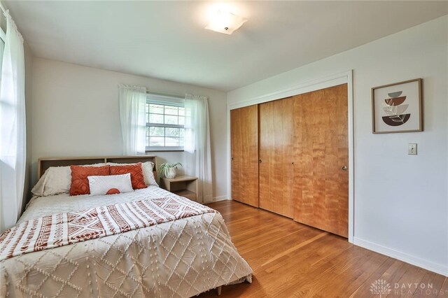 300 Magnolia Ave, Englewood, OH 45322 - bedroom with wood finished floors and a closet