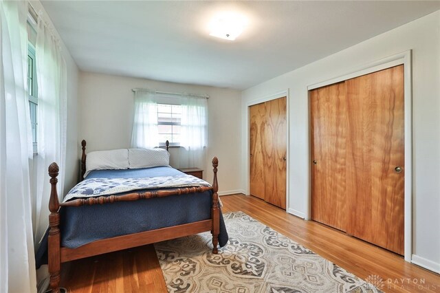 300 Magnolia Ave, Englewood, OH 45322 - bedroom with multiple closets and light wood-style flooring