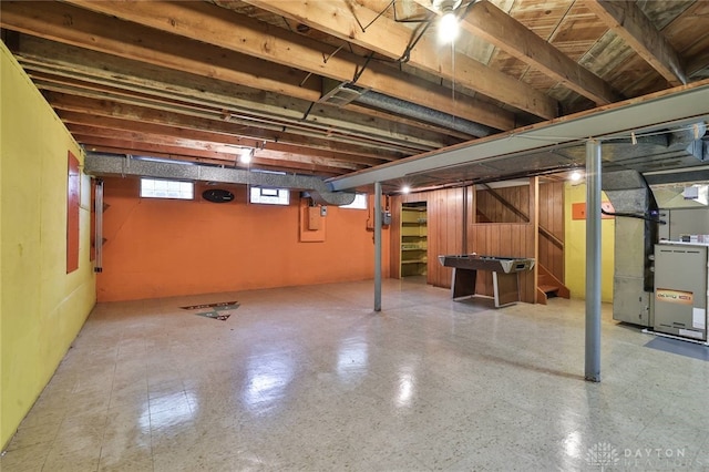300 Magnolia Ave, Englewood, OH 45322 - below grade area featuring heating unit, stairs, and tile patterned floors