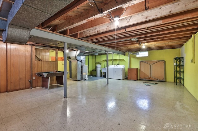 300 Magnolia Ave, Englewood, OH 45322 - basement with separate washer and dryer, heating unit, a water softener, wood walls, and tile patterned floors