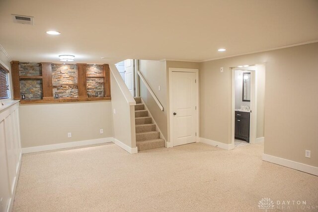 316 Honey Jane Dr, Beavercreek, OH 45434 - finished below grade area featuring stairs, crown molding, recessed lighting, light carpet, and bar