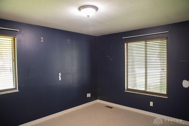 316 Honey Jane Dr, Beavercreek, OH 45434 - carpeted empty room featuring plenty of natural light and baseboards