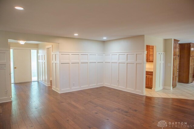 316 Honey Jane Dr, Beavercreek, OH 45434 - unfurnished room featuring light wood-type flooring, a decorative wall, and recessed lighting
