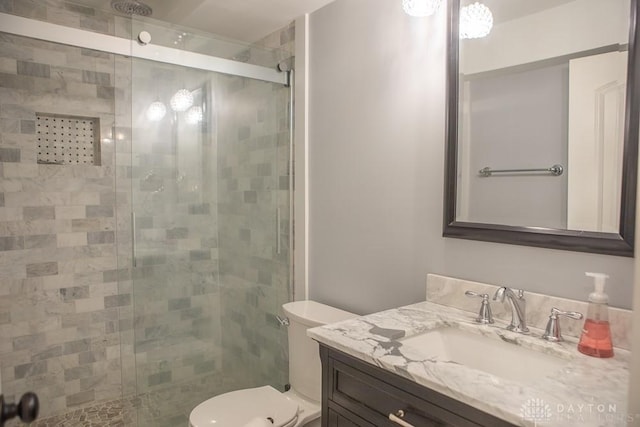 316 Honey Jane Dr, Beavercreek, OH 45434 - bathroom featuring vanity, a stall shower, and toilet