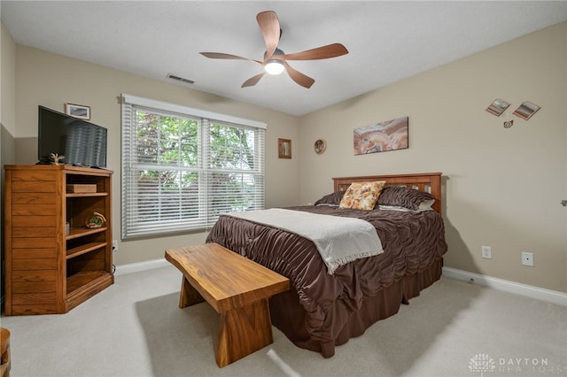 7607 Stone Ridge Dr, Springboro, OH 45066 - bedroom with light carpet, baseboards, and a ceiling fan