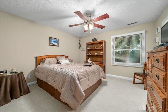 7607 Stone Ridge Dr, Springboro, OH 45066 - bedroom featuring light colored carpet, baseboards, and ceiling fan