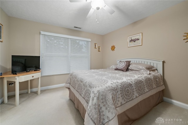 7607 Stone Ridge Dr, Springboro, OH 45066 - bedroom with light colored carpet, baseboards, and ceiling fan