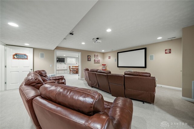 7607 Stone Ridge Dr, Springboro, OH 45066 - cinema room with light carpet, recessed lighting, and baseboards