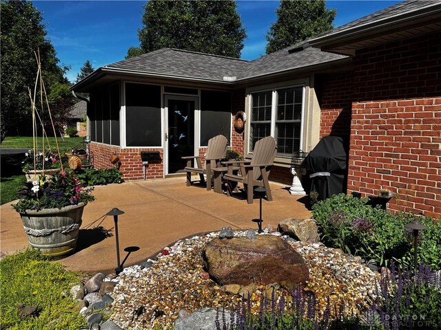 2460 Coriander Ct, Troy, OH 45373 - view of patio / terrace featuring a sunroom